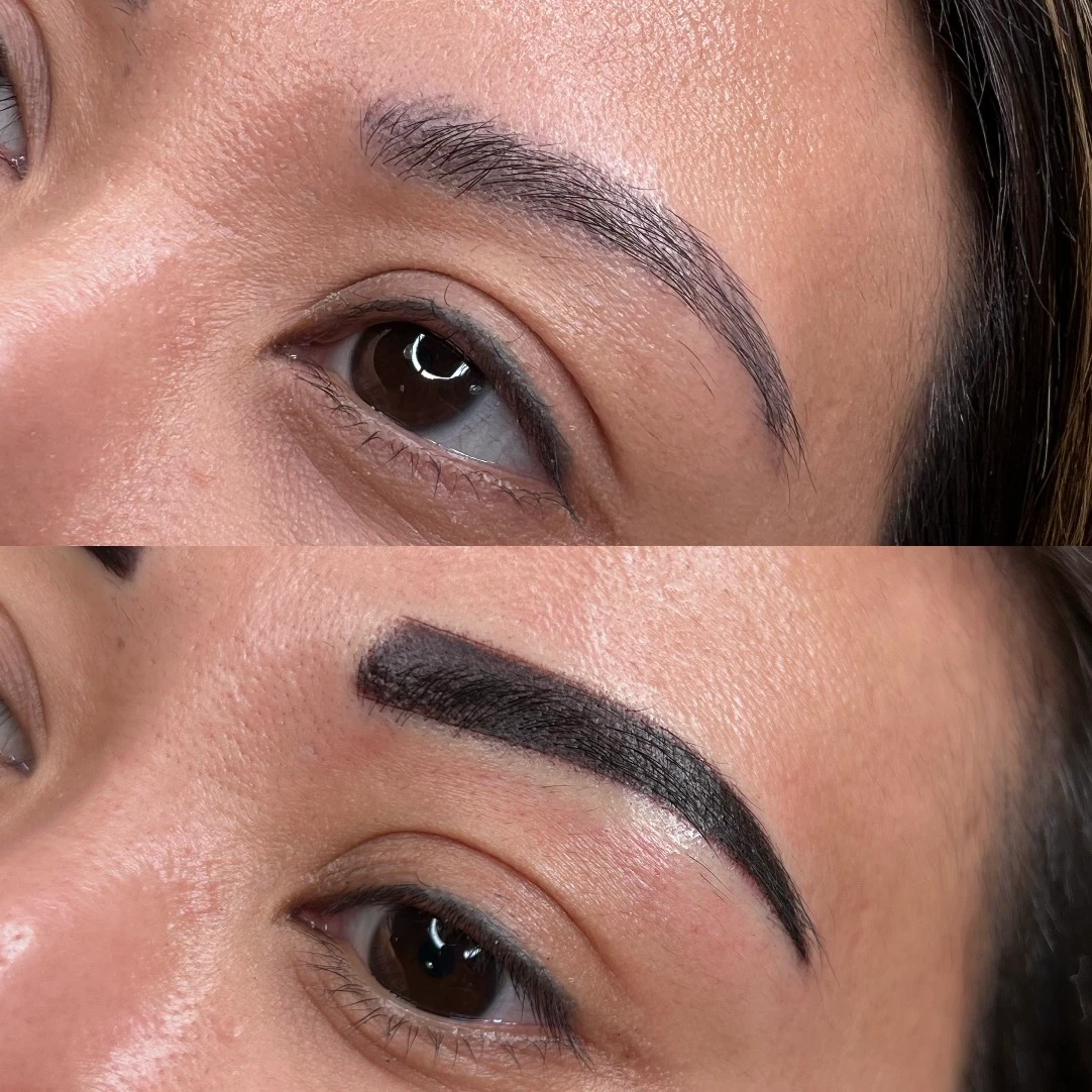 A woman with brown eyes and black eyebrows.